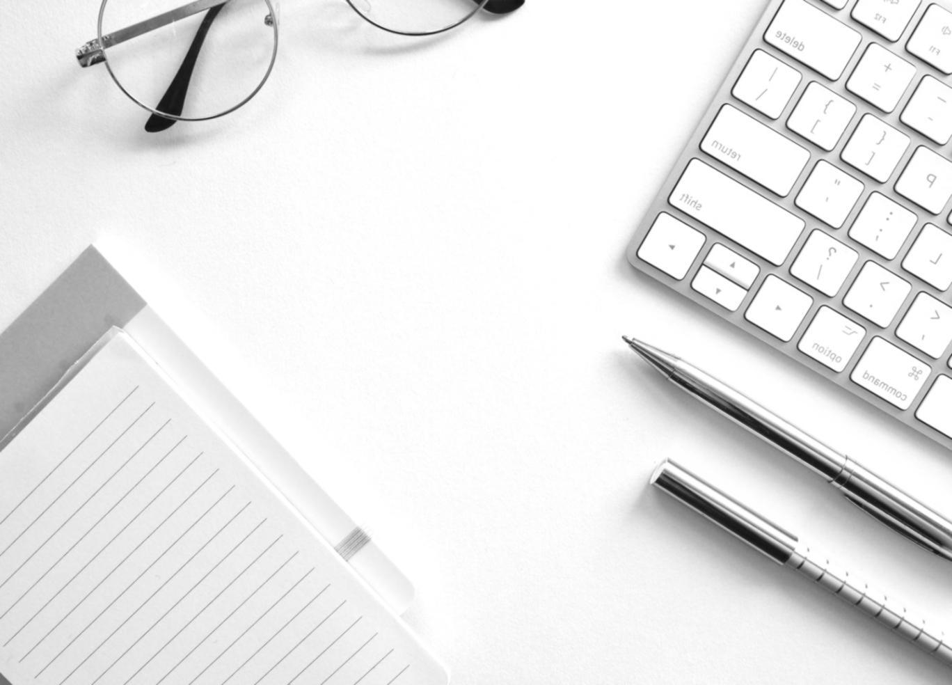 Office workspace showing team members engaged in budget review session